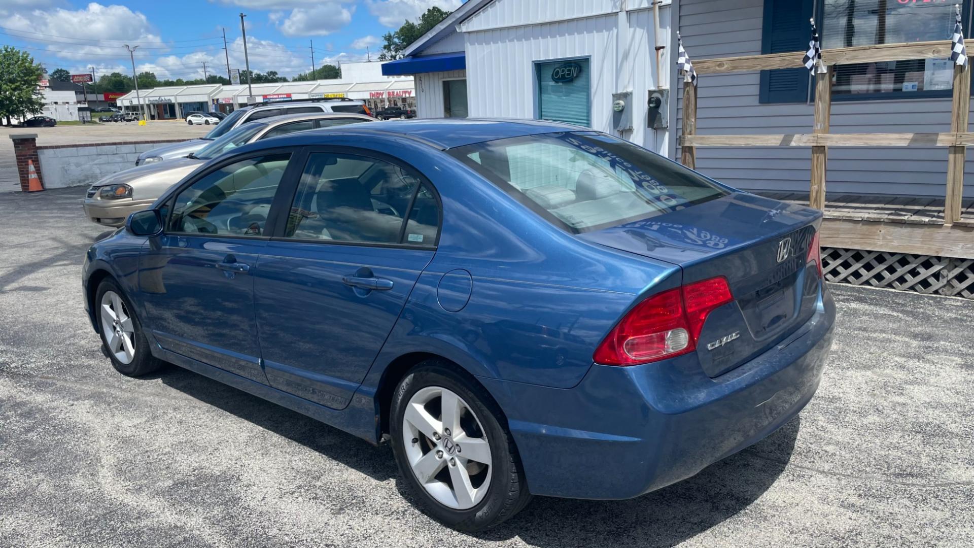 2006 BLUE Honda Civic EX Sedan (1HGFA158X6L) with an 1.8L L4 SOHC 16V engine, 5-Speed Manual transmission, located at 2710A Westlane Rd., Indianapolis, IN, 46268, (317) 291-2000, 39.885670, -86.208160 - Photo#2